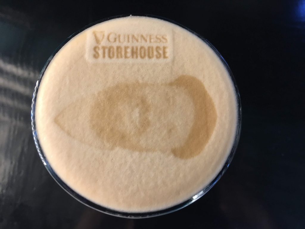 Image location: The Guinness Storehouse and Brewery, Dublin, Ireland. Image description: A photo of Chief Beer Correspondent, James Rowe is imprinted by a specialised printer onto the throth (or head) of the Guinness beer.